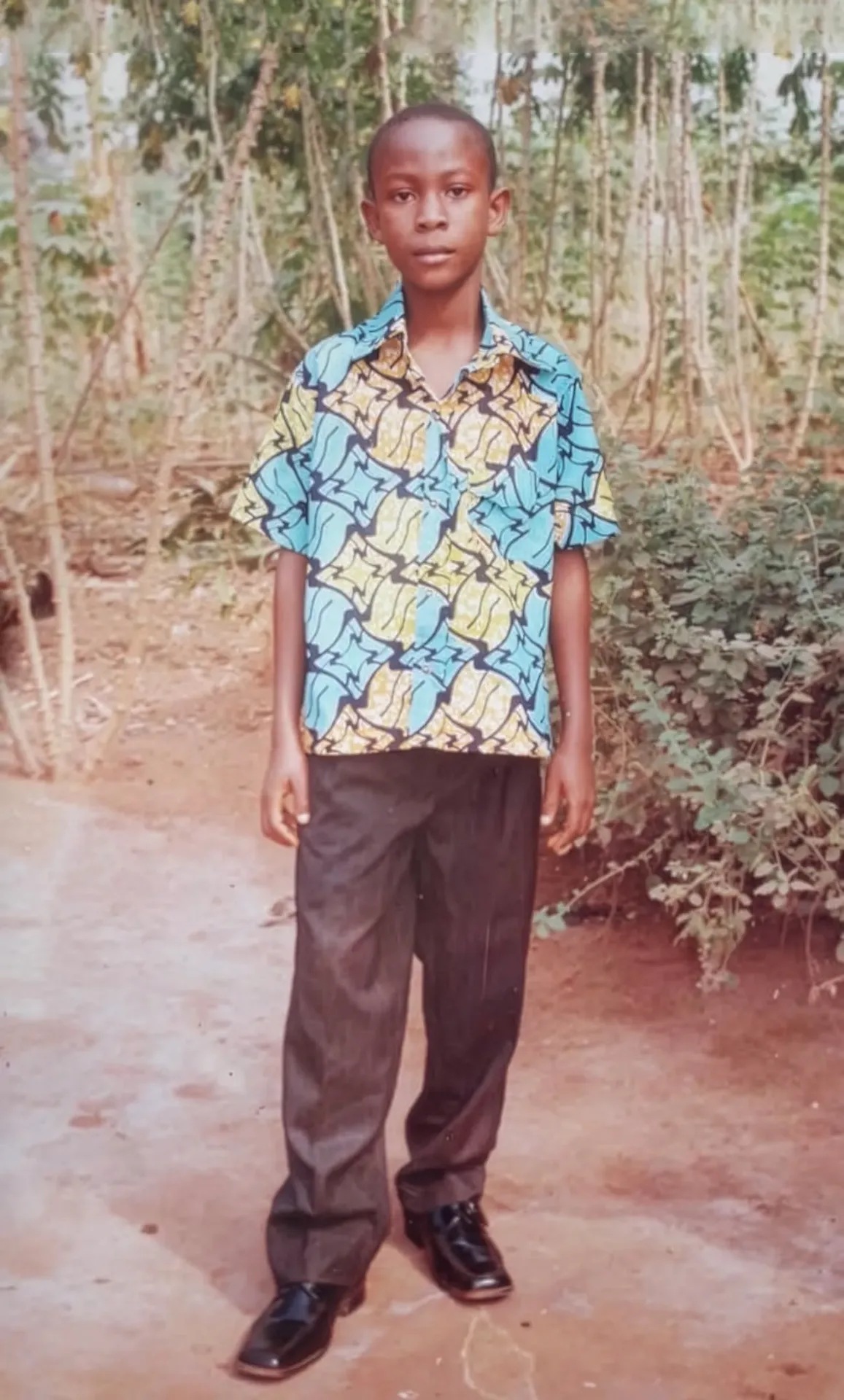 Kossivi als Kind in Togo